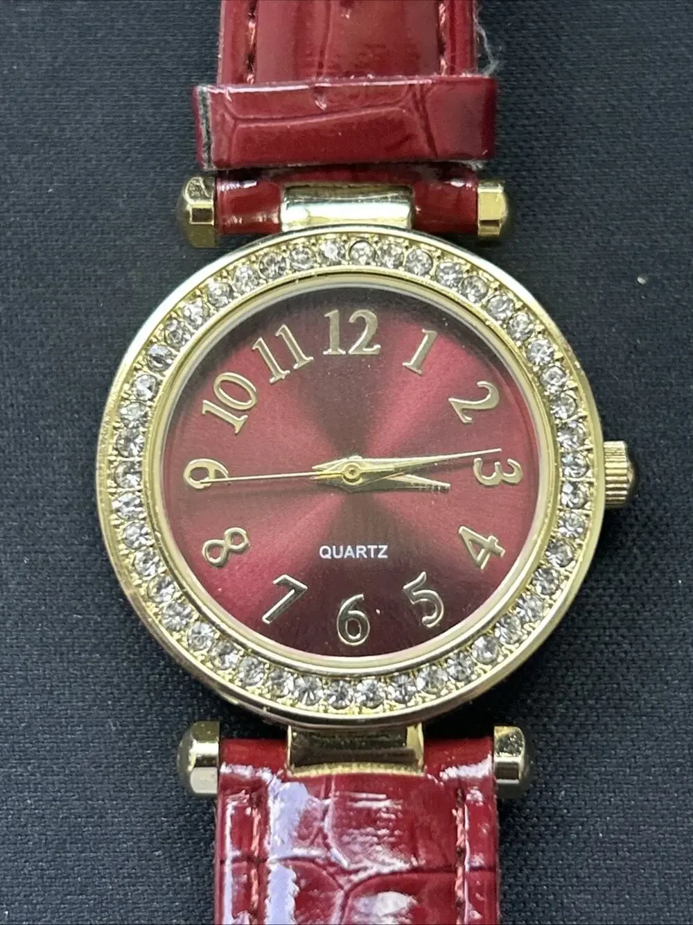 Gold Tone Red Dial And Band Women’s Quartz Watch